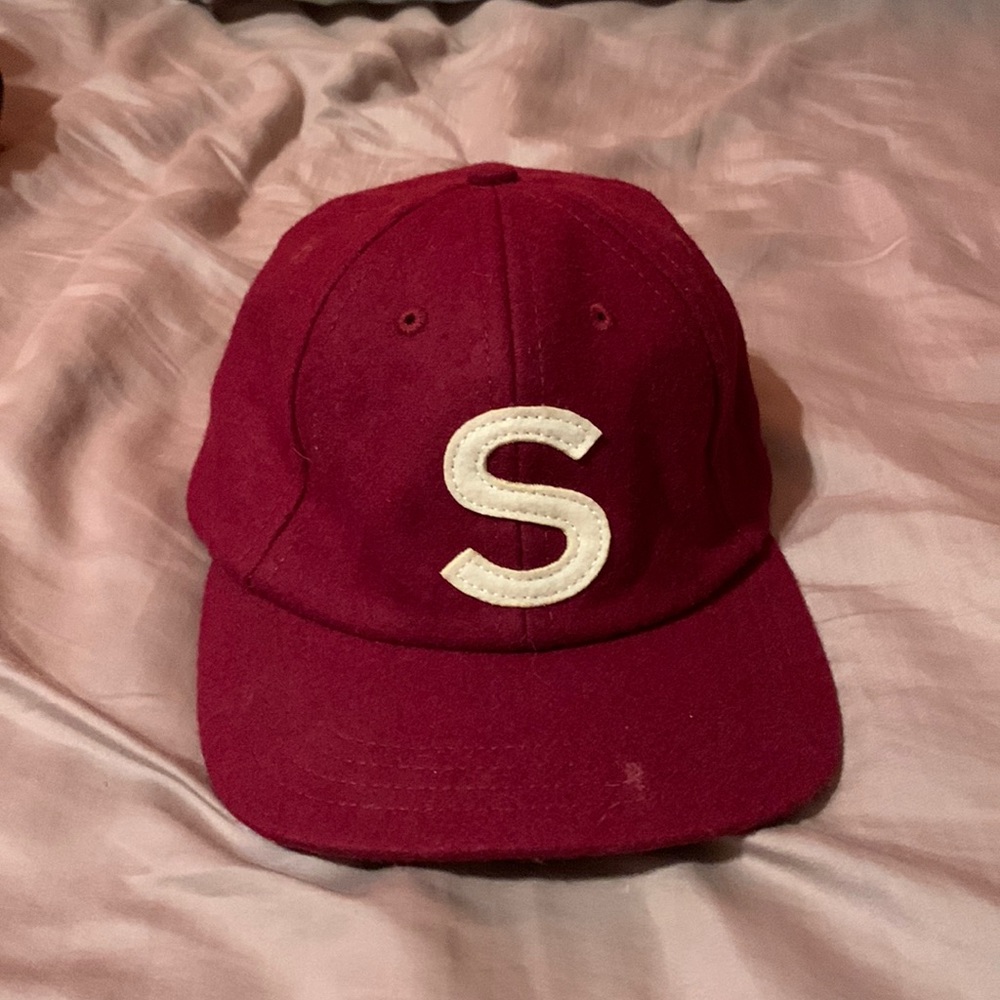 Spoken wool hat. Never worn. Take it off my hands.